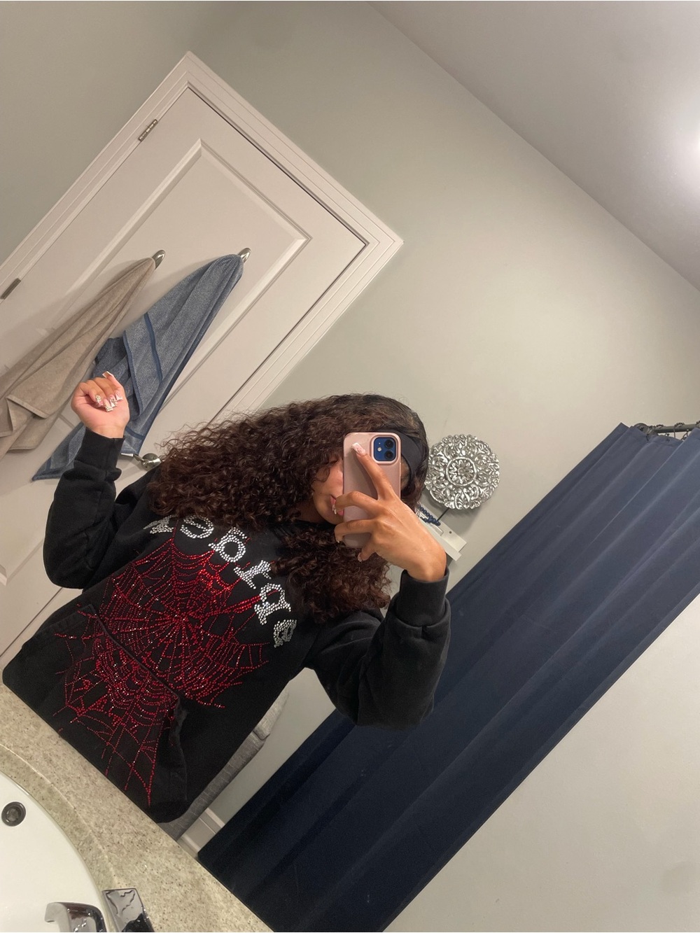 Black Crewneck Sweater with Red Spiderweb Graphic